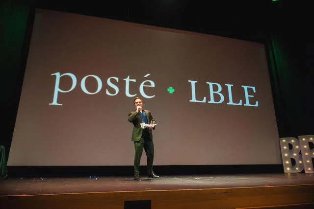 Poste presenting production technology on stage